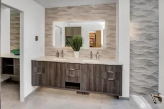 Primary bathroom with Porcelanosa large format floor tile and "wave" wall tile