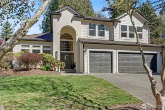 Front view, talk about curb appeal! All new paint really makes this home stand out. Large 3-car garage and widened driveway (plus RV/Boat parking behind the gate) giving you plenty for you and your guests.