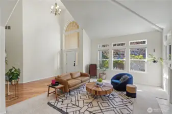 As you enter the home, you will find this dramatic, soaring 2-story entry and formal living room with gas fireplace. All new interior paint and fixtures throughout, spectacular.