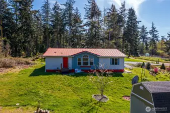 aerial photo of house and Tough Shed