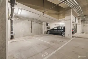 Parking space 49 on level P2. A couple spots to the right is an illustration of the charging station available to be installed.