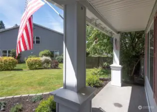 Front porch is a perfect place to admire the quiet cul-de-sac location.
