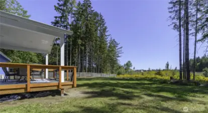 Enjoy the morning sunshine on your back deck. Behind this parcel is a 5 acre parcel, space in-between your neighbors.  Sunsets from front yard.