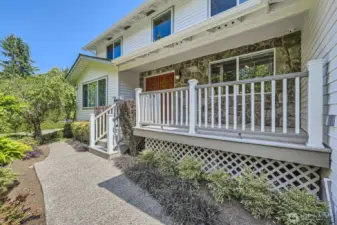 You and your guests will feel right at home with the welcoming covered front porch, double door entry and cement concrete faux stone facade.