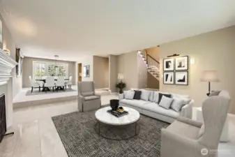 The spacious living and dining rooms feature brand new carpet and abundant light.