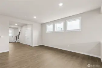 Formal dining area to open entry.