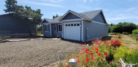 Effortless coastal living meets prime canal frontage in this stylish single-level retreat. With a low-maintenance yard and direct water access just steps from your door, it's the ideal Surfside escape for those who crave both convenience and natural beauty.