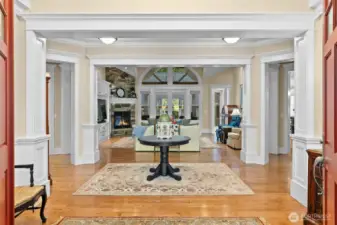 Formal entryway shows off the extensive trim and woodwork in the home.