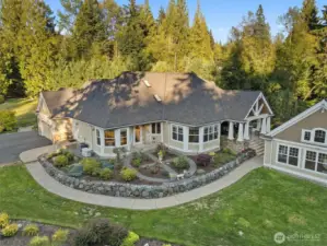 See the peaceful back yard rose garden.  Home has presidential roof.  Pool house was just reroofed with matching presidential roof.