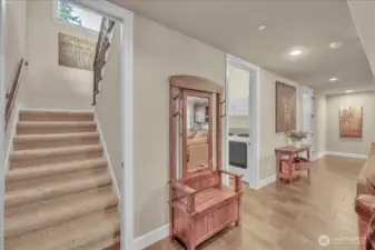 Downstairs Laundry room on the left past the stairs