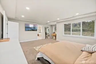 Sprawling primary suite with luxurious bath and massive walk-in closet
