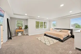 Sprawling primary suite with luxurious bath and massive walk-in closet