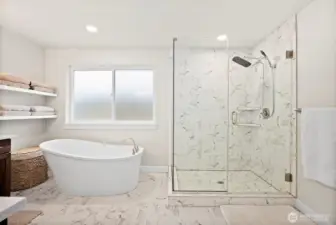 Sprawling primary suite with luxurious bath and massive walk-in closet