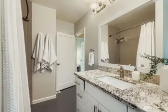 Both bathrooms have been refreshed with modern touches and functional design, making daily routines feel effortless.