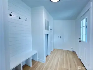 New drop zone greets you when you enter the house through the carport side. Ready to quickly install side by side laundry machines of your choosing.