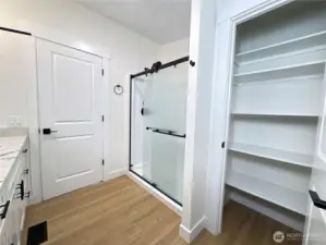 Freshly painted primary bathroom closet.