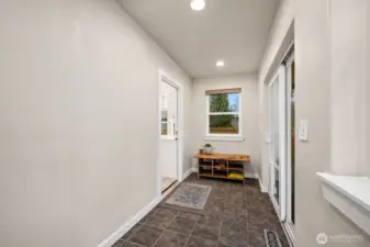 Sunroom is heated and cooled - room for home office or studio space