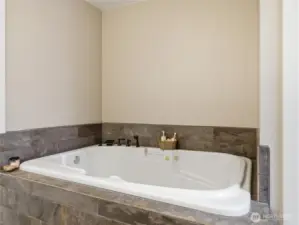 oversized jetted tub in the primary ensuite
