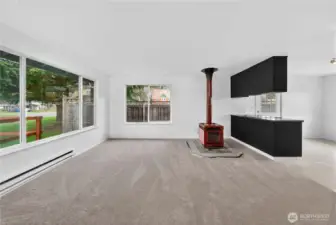 Oversized windows fill the space with natural light