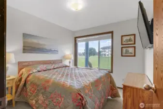 Main condo bedroom with king bed
