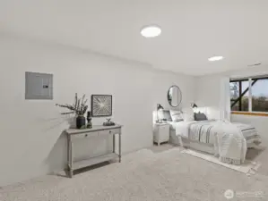 Just through the door is the 1st bedroom on the lower level.