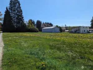 Lot 1 looking East Patrick Drive.  Lot 4 in background goes beyond the trees.