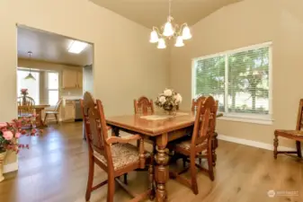 Formal dining room looking into kitchen