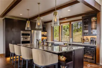 A cook's kitchen with seating at the island is the perfect way to create lasting memories.
