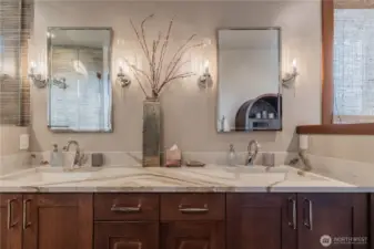 Primary suite bathroom has heated floors and Toto toilet with washlette.