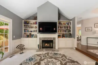 ...& a cozy fireplace with built-in bookshelves!