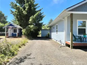 Long and Level Driveway. Curb Appeal and low maintenance   landscaping make this coastal charmer ready   to enjoy today
