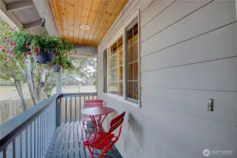 Covered front porch ready for your morning coffee.