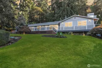 Beautiful Sammamish home with landscaped front yard and private lot setting.