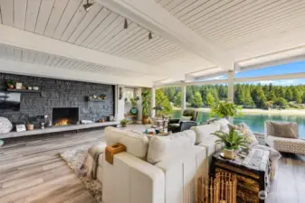 Spacious Great room with a gas fireplace and awesome Bay views