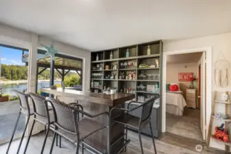 Bar area in Family room with views looking into 2nd bedroom