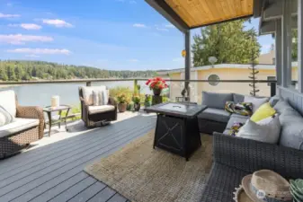 Main level deck off of the kitchen and Great room. One half of the deck is covered