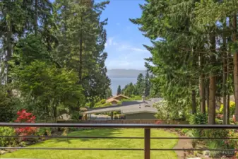 Revel in west-facing Puget Sound views that captivate from all three levels of the home.