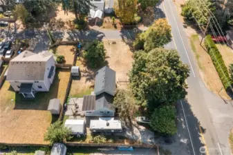 Generous lot size with sunny outdoor spaces surrounding this historic home. The large apple tree in the yard is a reminder of the property’s original orchard roots