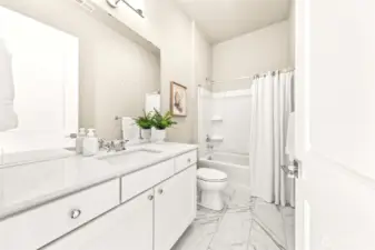 Full second bath with contemporary finishes.