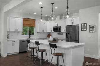 Chef’s kitchen, with ample storage and high-end finishes