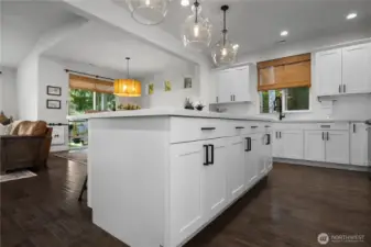 Large island with pull out shelves in cabinets