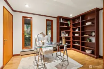 Main floor den with built-ins.