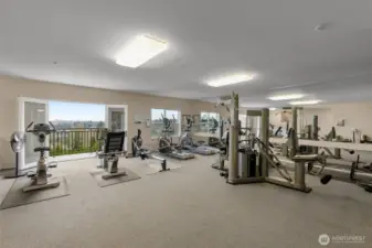Fully equipped fitness center located on top floor overlooking golf course and downtown.