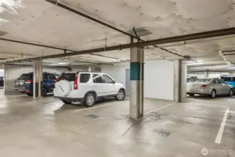 Several guest spots throughout the secure garage for your guests. These two are directly across from the dedicated parking spot for condo 302.