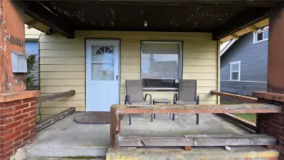 Paint the trim and bring your hanging plants and porch swing....