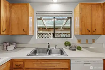 kitchen with window to covered front porch