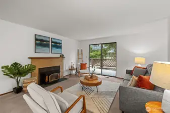 Living room goes to slider to very large deck