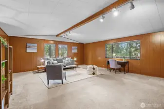 This family room is massive!  Has a closet too.  Can also be used as a primary suite if you wish or split it into 2 separate rooms.  Unlimited potential!