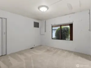 The 1st of 2 bedrooms is great for a home office or for overnight guests.