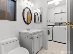 The attached bathroom has dual access.